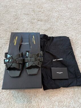 Saint Laurent Tribute Leather Slides.
